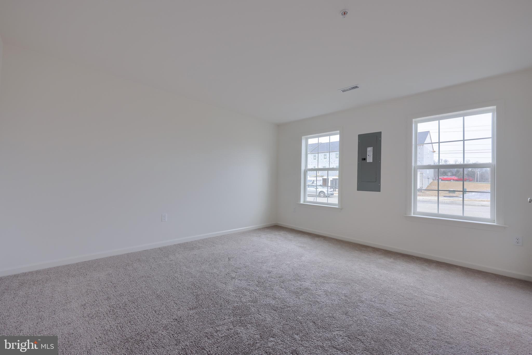 2417 Spring Water Circle Lancaster, PA 17601 - Photo 9 of 35 an empty room with windows