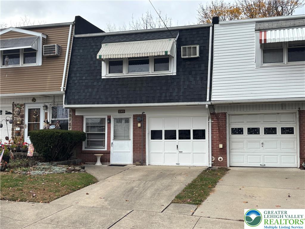 2303 4th Street Easton, PA 18042 - Photo 1 of 18 a view of a house with a yard and large windows