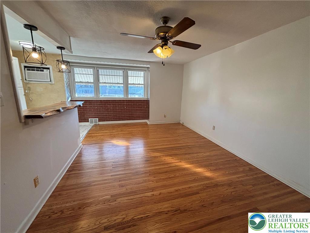 2303 4th Street Easton, PA 18042 - Photo 10 of 18 wooden floor in an empty room with a window