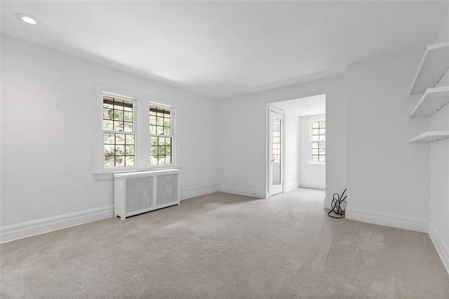 an empty room with an entryway