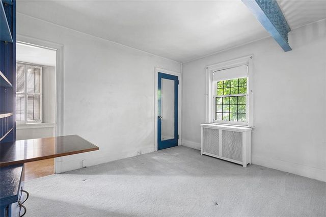 a view of an empty room with window