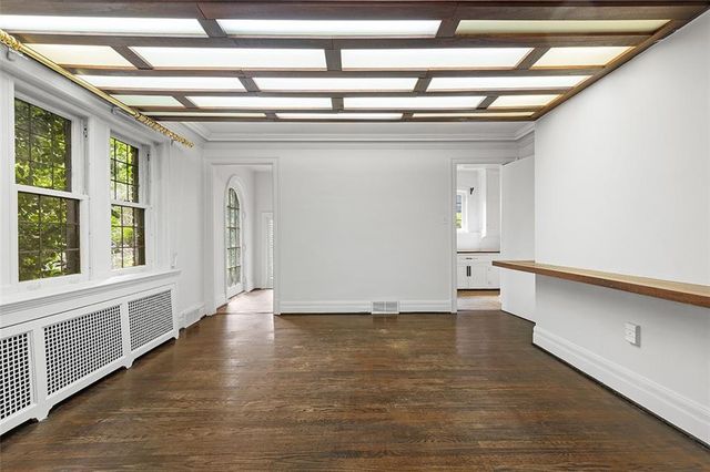 a kitchen with a stove and a refrigerator