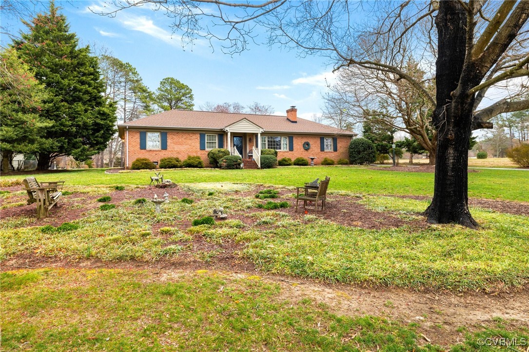 5970 Springfield Road Glen Allen, VA 23060 - Photo 2 of 23 a front view of a house with a yard