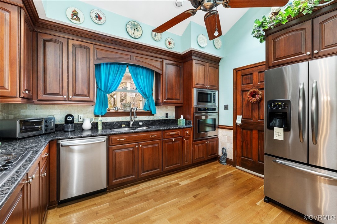 5970 Springfield Road Glen Allen, VA 23060 - Photo 8 of 23 a kitchen with stainless steel appliances granite countertop a refrigerator a stove a sink and dishwasher
