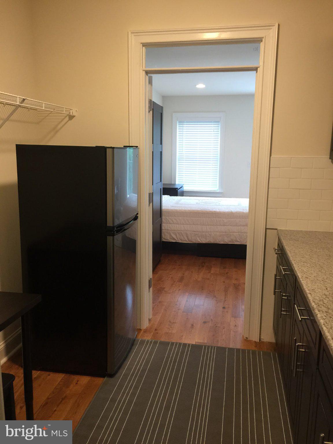 4080 Spring Garden Street Philadelphia, PA 19104 - Photo 25 of 28 Charming kitchen with cozy bedroom view.
