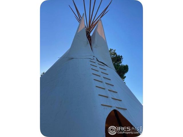 a picture of outdoor space with wooden floor