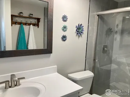 a view of a field with a sign board