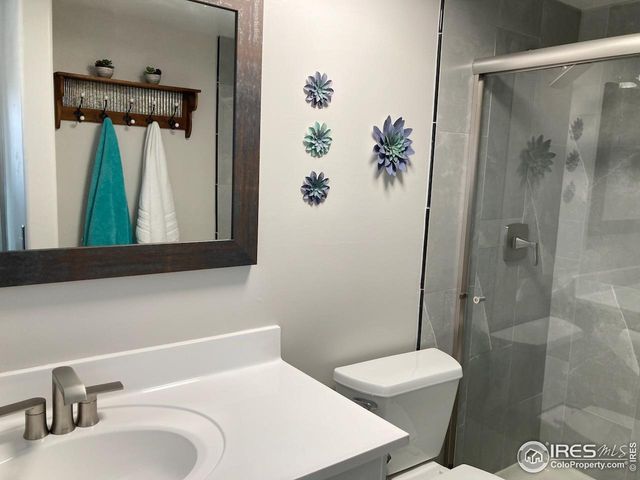 a view of a field with a sign board