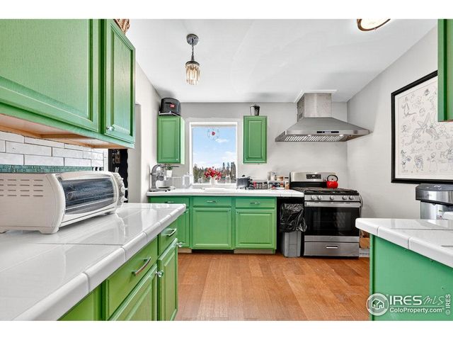 a bedroom with a bed and a mirror