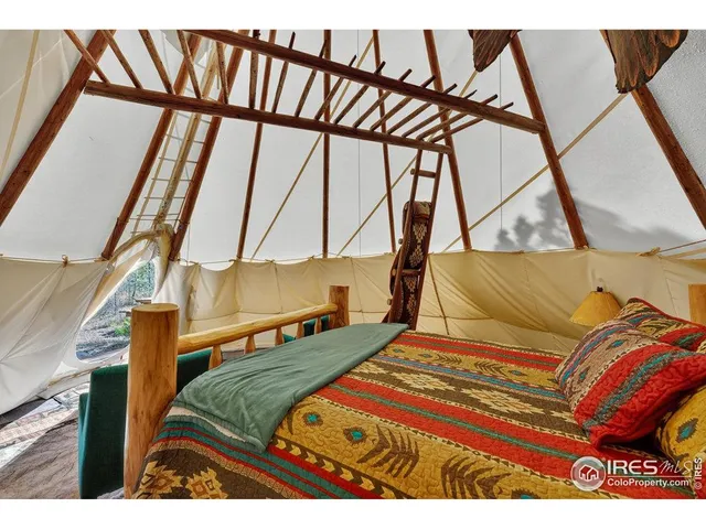 a view of a patio with swimming pool and mountain view
