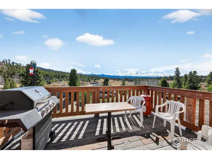 a view of a porch with a backyard