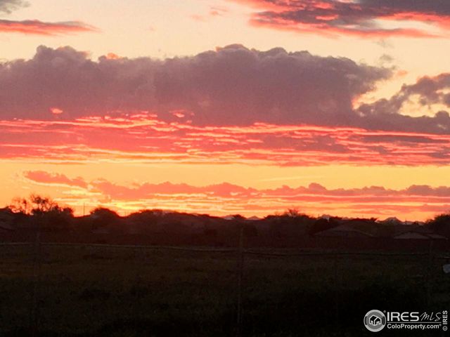 a view of a backyard of a house