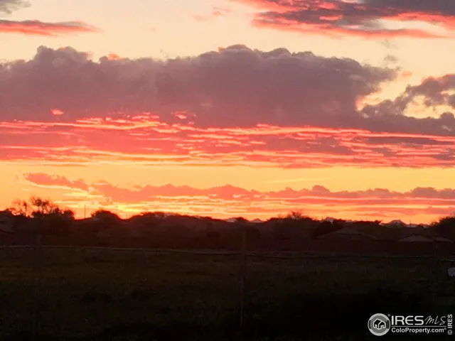 a view of a backyard of a house