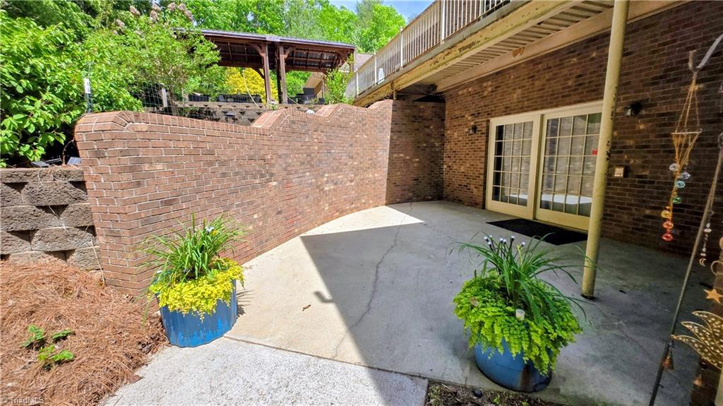 7035 Skylark Road Pfafftown, NC 27040 - Photo 43 of 47 Beautifully Landscaped Access to Private Lower-Level Entrances ...