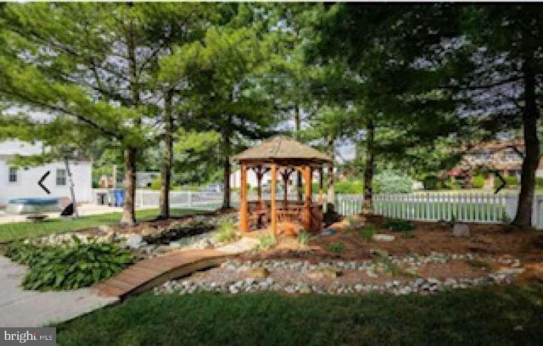 505 East Evesham Road Voorhees, NJ 08043 - Photo 15 of 18 a garden view with a seating space
