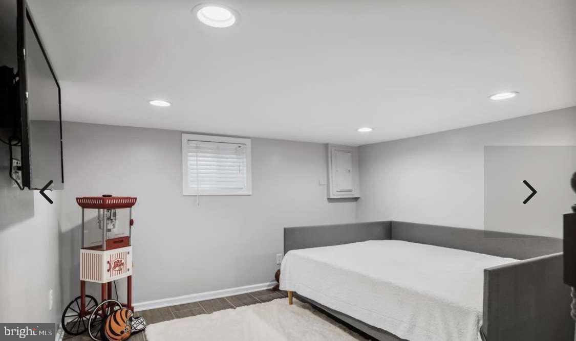 505 East Evesham Road Voorhees, NJ 08043 - Photo 16 of 18 a bedroom with a bed and a flat screen tv