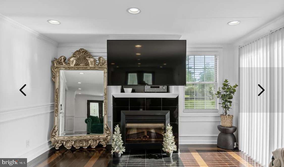 505 East Evesham Road Voorhees, NJ 08043 - Photo 3 of 18 a living room with furniture and a fireplace