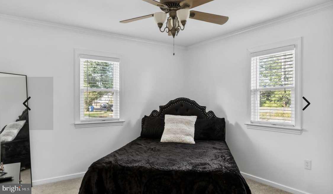 505 East Evesham Road Voorhees, NJ 08043 - Photo 10 of 18 a bedroom with a bed and a window