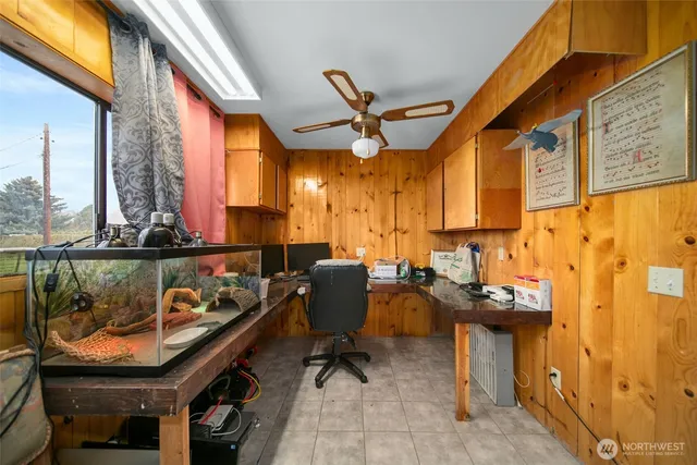 a view of a chairs and table in a patio