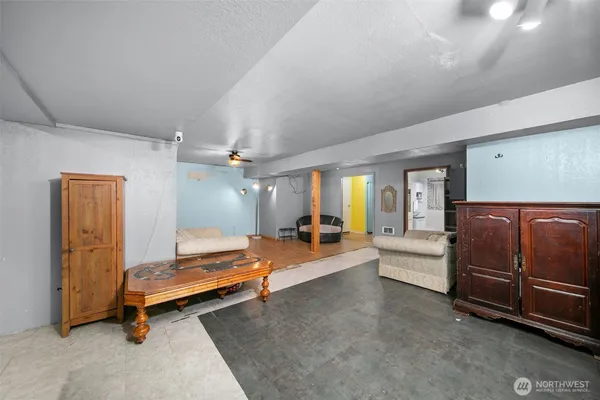 a bedroom with furniture and window