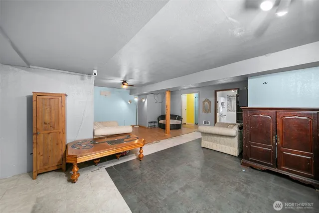 a bedroom with furniture and window