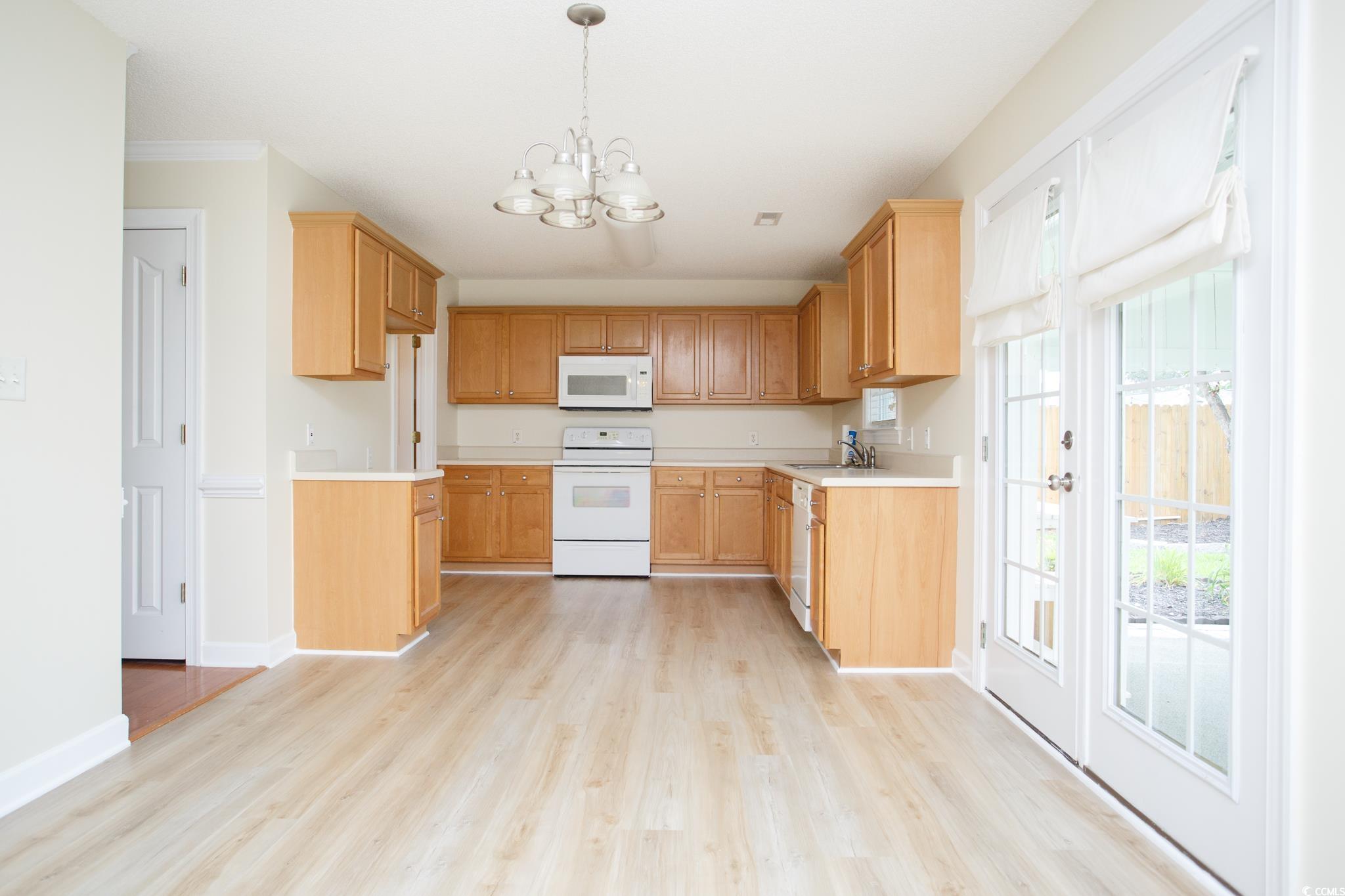 112 Molinia Drive Murrells Inlet, SC 29576 - Photo 13 of 40 New luxury vinyl flooring