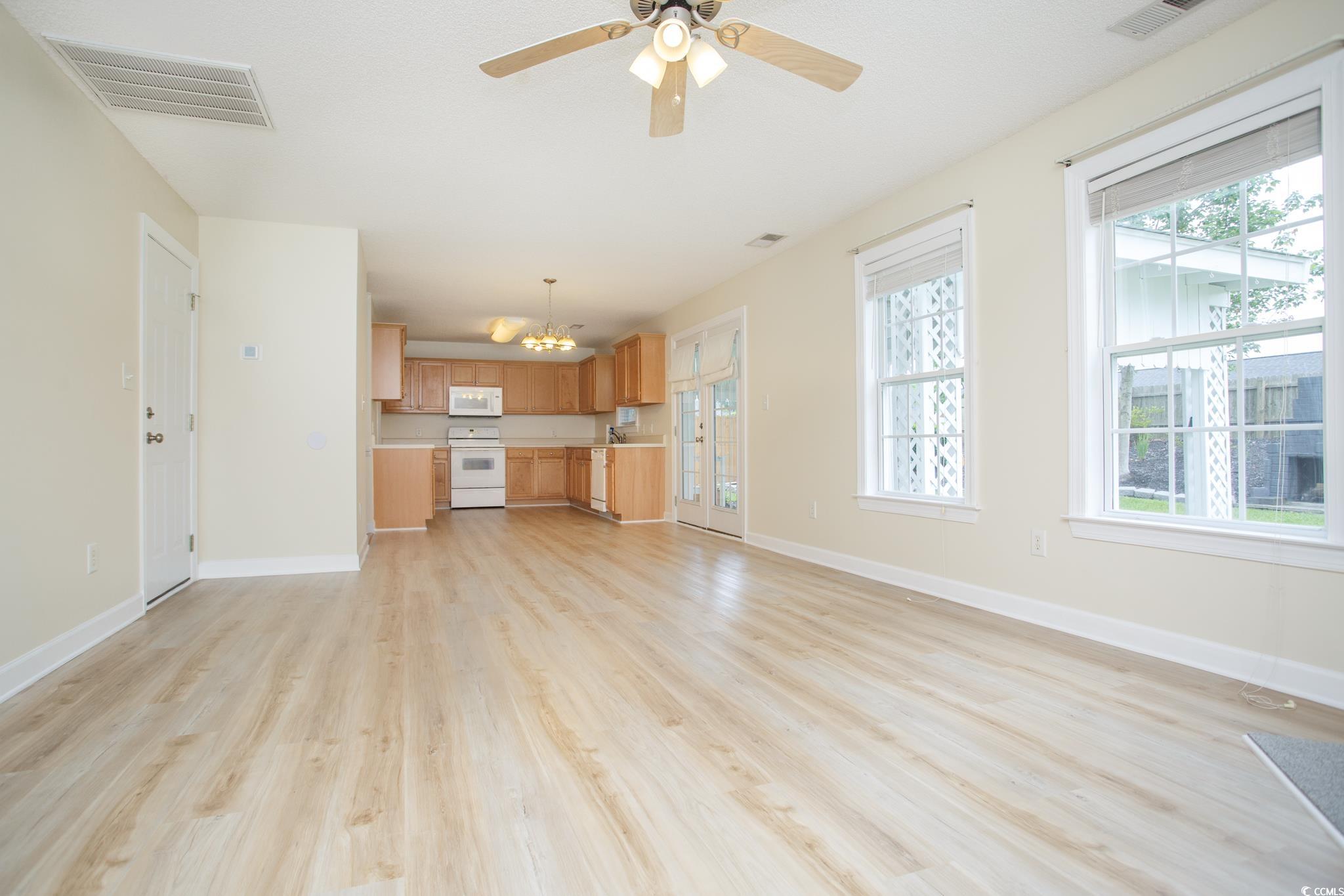112 Molinia Drive Murrells Inlet, SC 29576 - Photo 8 of 40 New luxury vinyl flooring