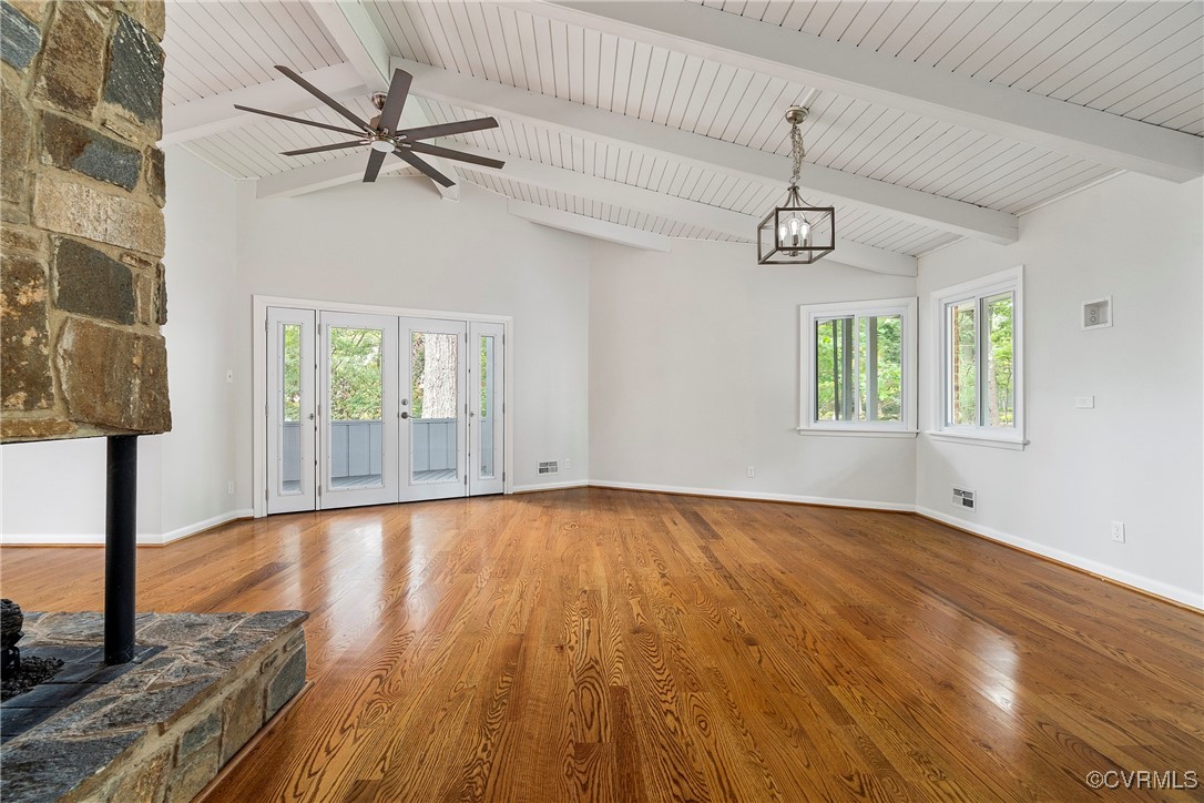 2861 West Brigstock Road Midlothian, VA 23113 - Photo 9 of 48 Unfurnished living room with ceiling fan with nota