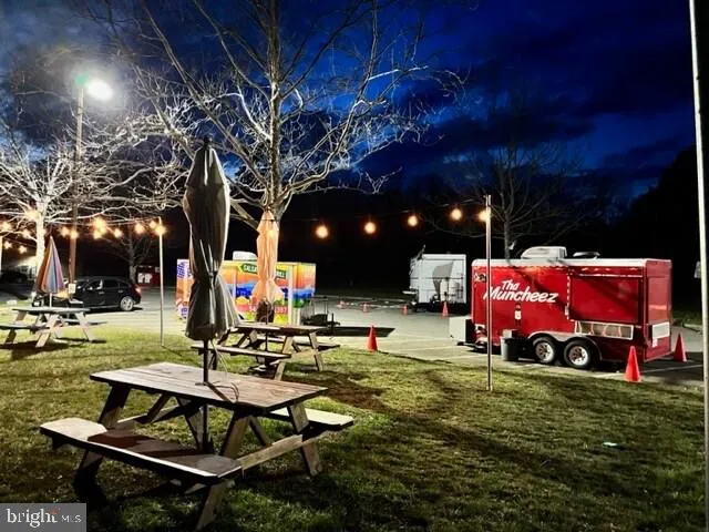 a childrens park with lots of swings and slides