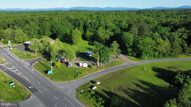 a view of a pool with a yard