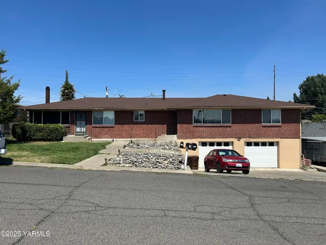 a car parked in front of a house