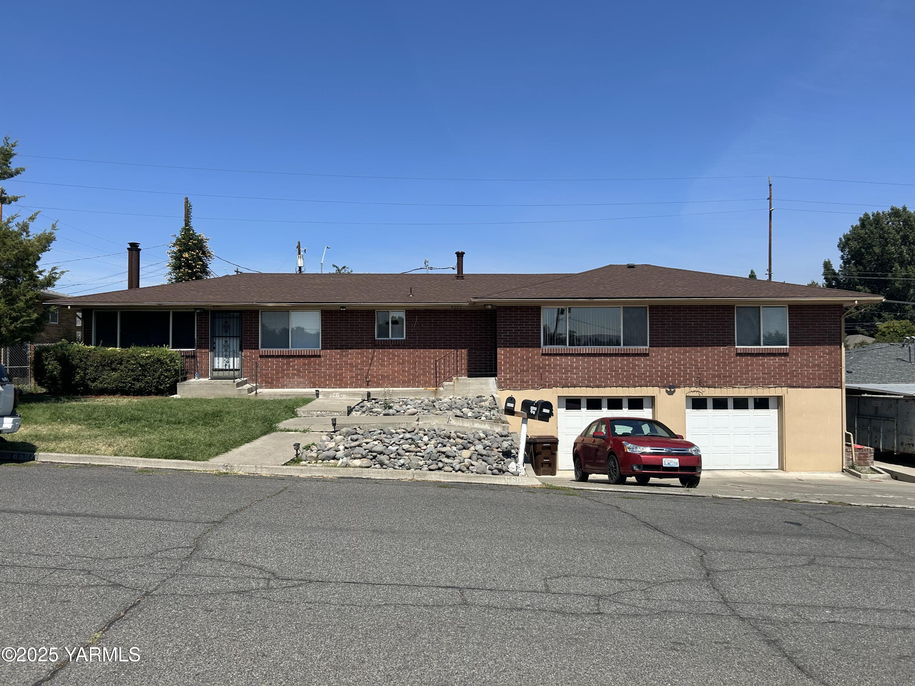 a car parked in front of a house
