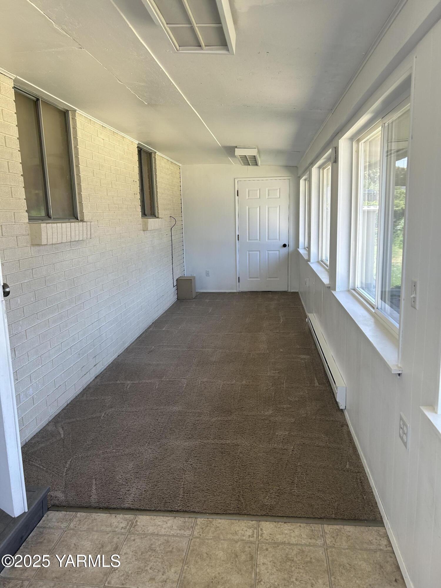 6505 Alpine Way Yakima, WA 98908 - Photo 16 of 18 a view of an empty room with a window