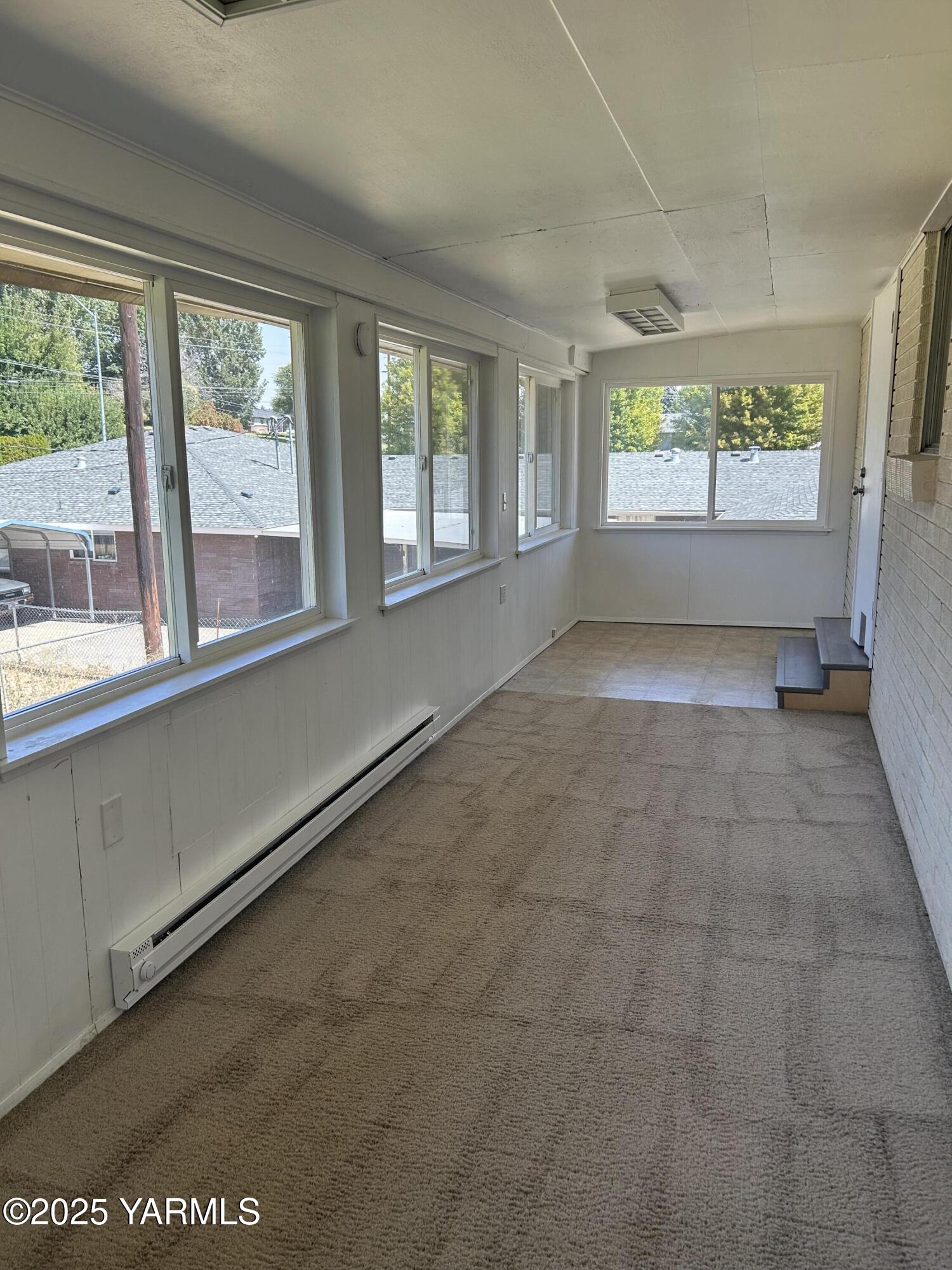 6505 Alpine Way Yakima, WA 98908 - Photo 10 of 18 a view of an empty room with a window