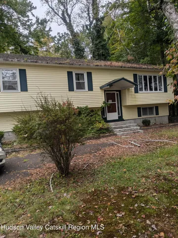a house view with a garden space