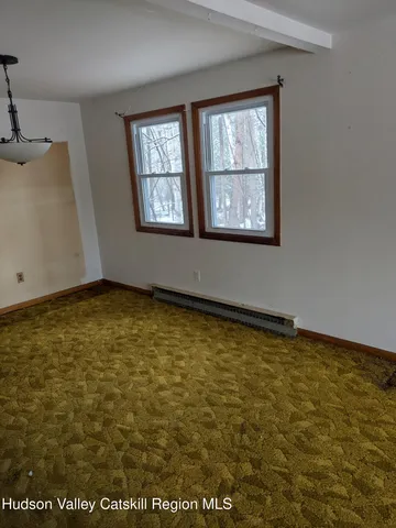 an empty room with window