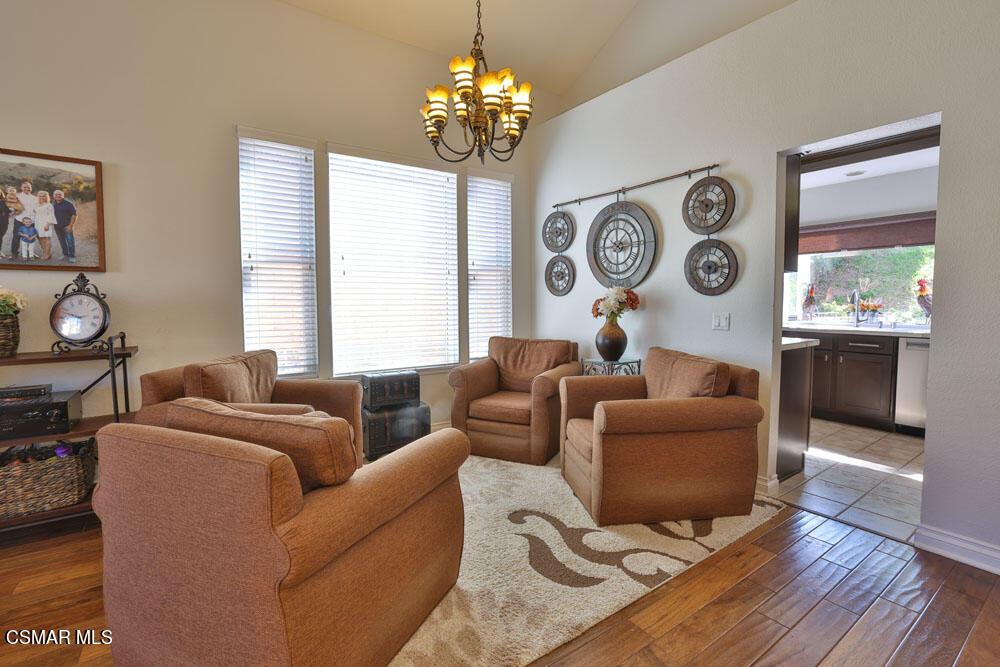 13620 Chesterfield Drive Moorpark, CA 93021 - Photo 12 of 52 a living room with furniture a window and wooden floor