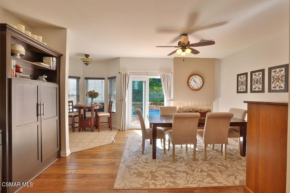 13620 Chesterfield Drive Moorpark, CA 93021 - Photo 15 of 52 a view of a dining room with furniture window and wooden floor