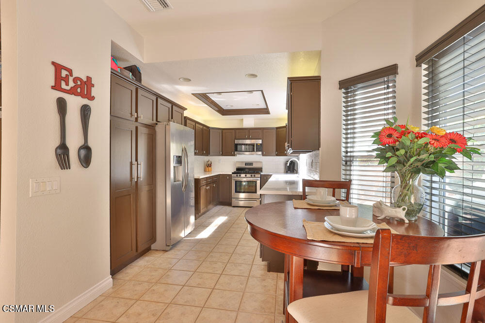 13620 Chesterfield Drive Moorpark, CA 93021 - Photo 21 of 52 a dinning room with furniture