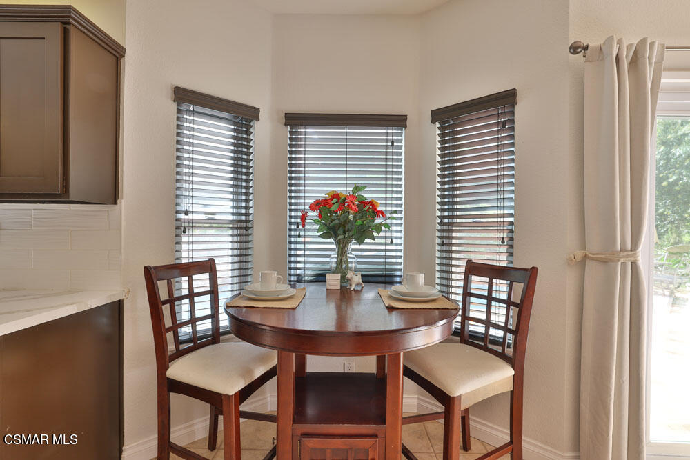 13620 Chesterfield Drive Moorpark, CA 93021 - Photo 23 of 52 a dining room with furniture and window