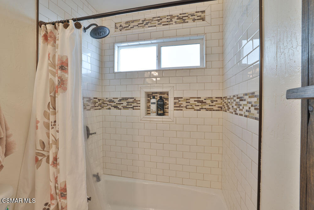 13620 Chesterfield Drive Moorpark, CA 93021 - Photo 28 of 52 a bathroom with a shower