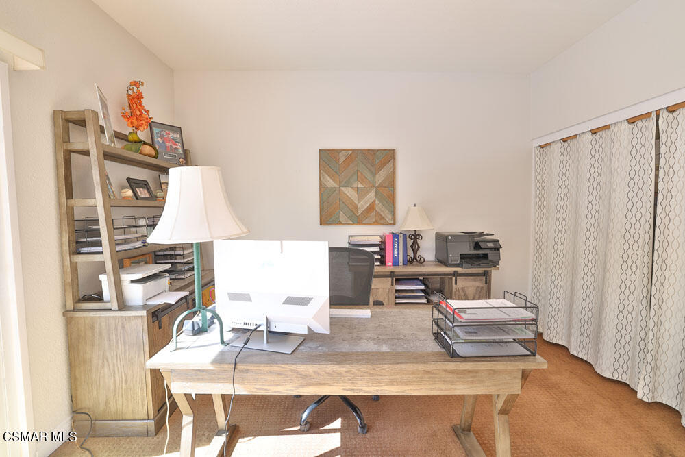 13620 Chesterfield Drive Moorpark, CA 93021 - Photo 30 of 52 a view of kitchen island with granite countertop furniture and a sink