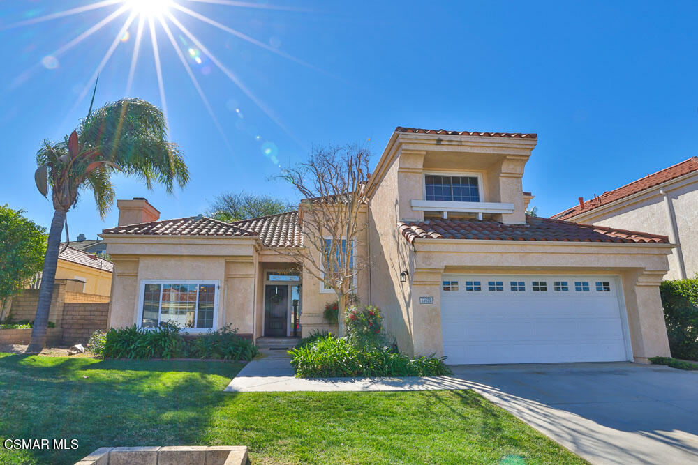 13620 Chesterfield Drive Moorpark, CA 93021 - Photo 3 of 52 front view of a house with a yard