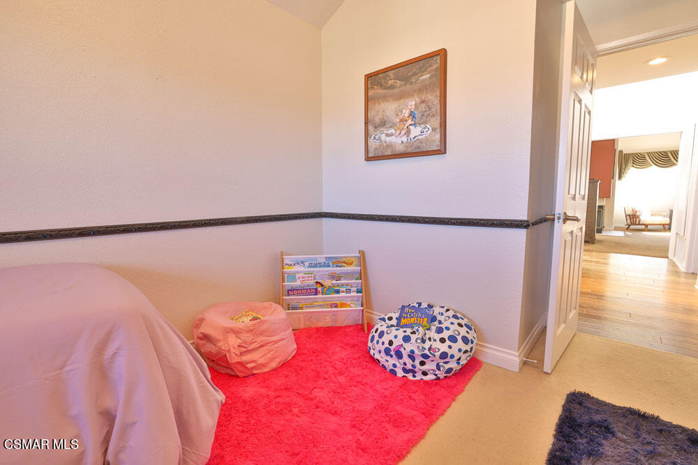 13620 Chesterfield Drive Moorpark, CA 93021 - Photo 35 of 52 a bedroom with a bed and a painting on the wall