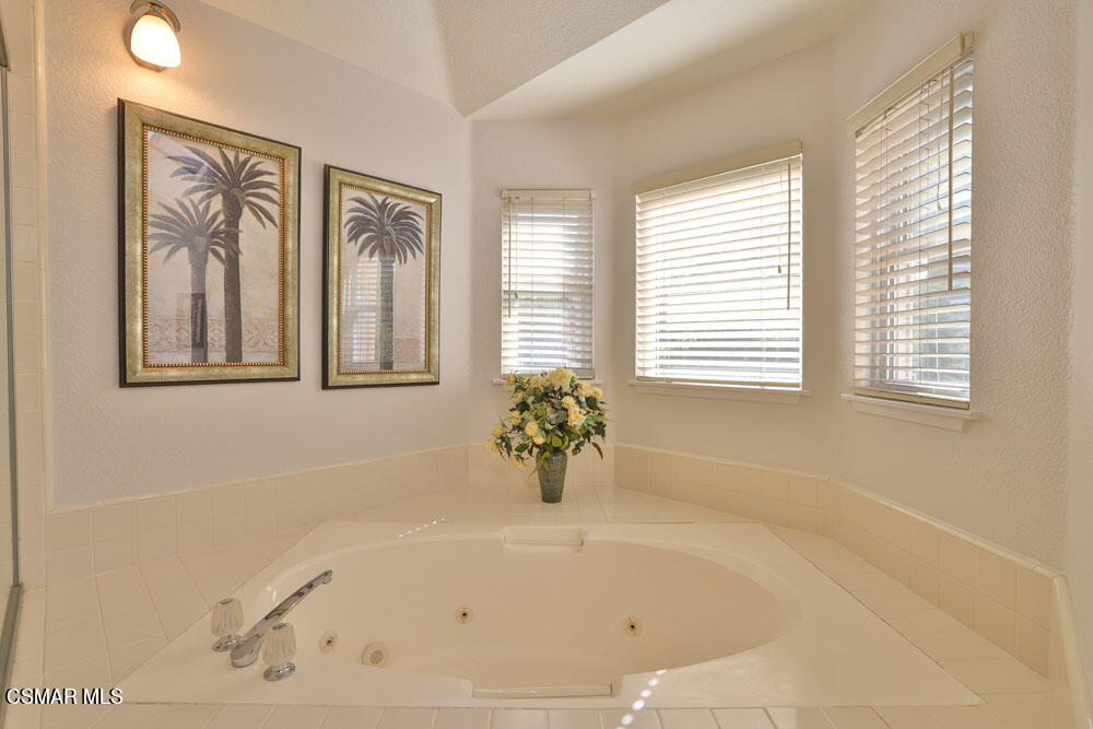 13620 Chesterfield Drive Moorpark, CA 93021 - Photo 43 of 52 a white bath tub sitting next to a window