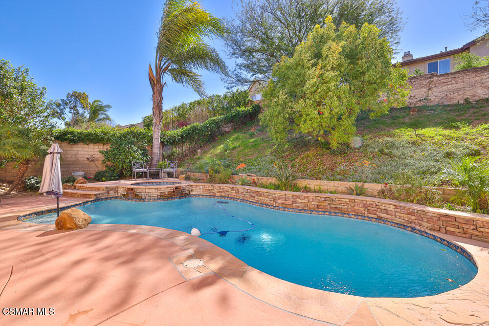13620 Chesterfield Drive Moorpark, CA 93021 - Photo 45 of 52 a view of a swimming pool with an outdoor space