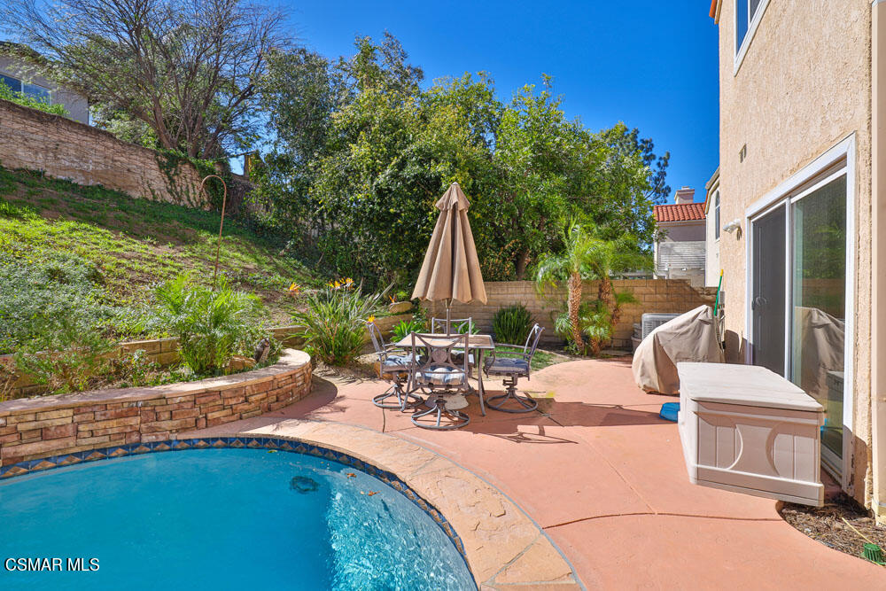 13620 Chesterfield Drive Moorpark, CA 93021 - Photo 46 of 52 a view of a swimming pool with a patio