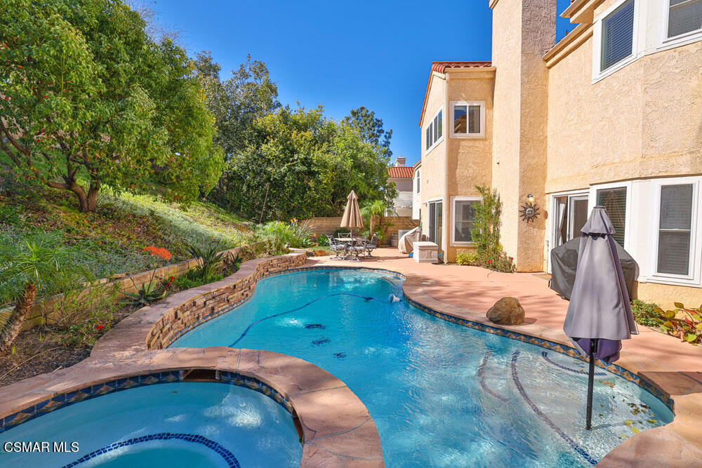 13620 Chesterfield Drive Moorpark, CA 93021 - Photo 47 of 52 a view of a swimming pool with a patio