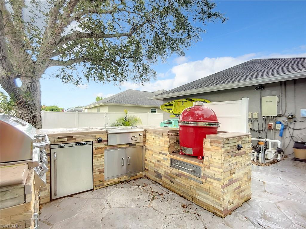 10231 Boca Circle Naples, FL 34109 - Photo 40 of 44 an outdoor space with a stove