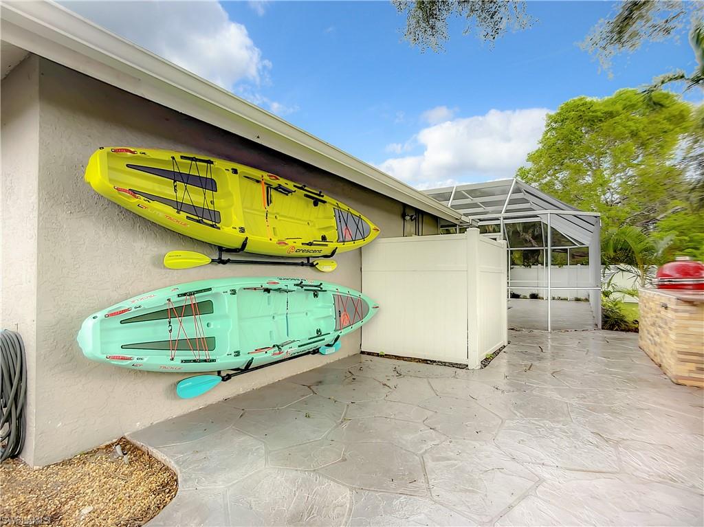 10231 Boca Circle Naples, FL 34109 - Photo 42 of 44 a view of a house with a garage